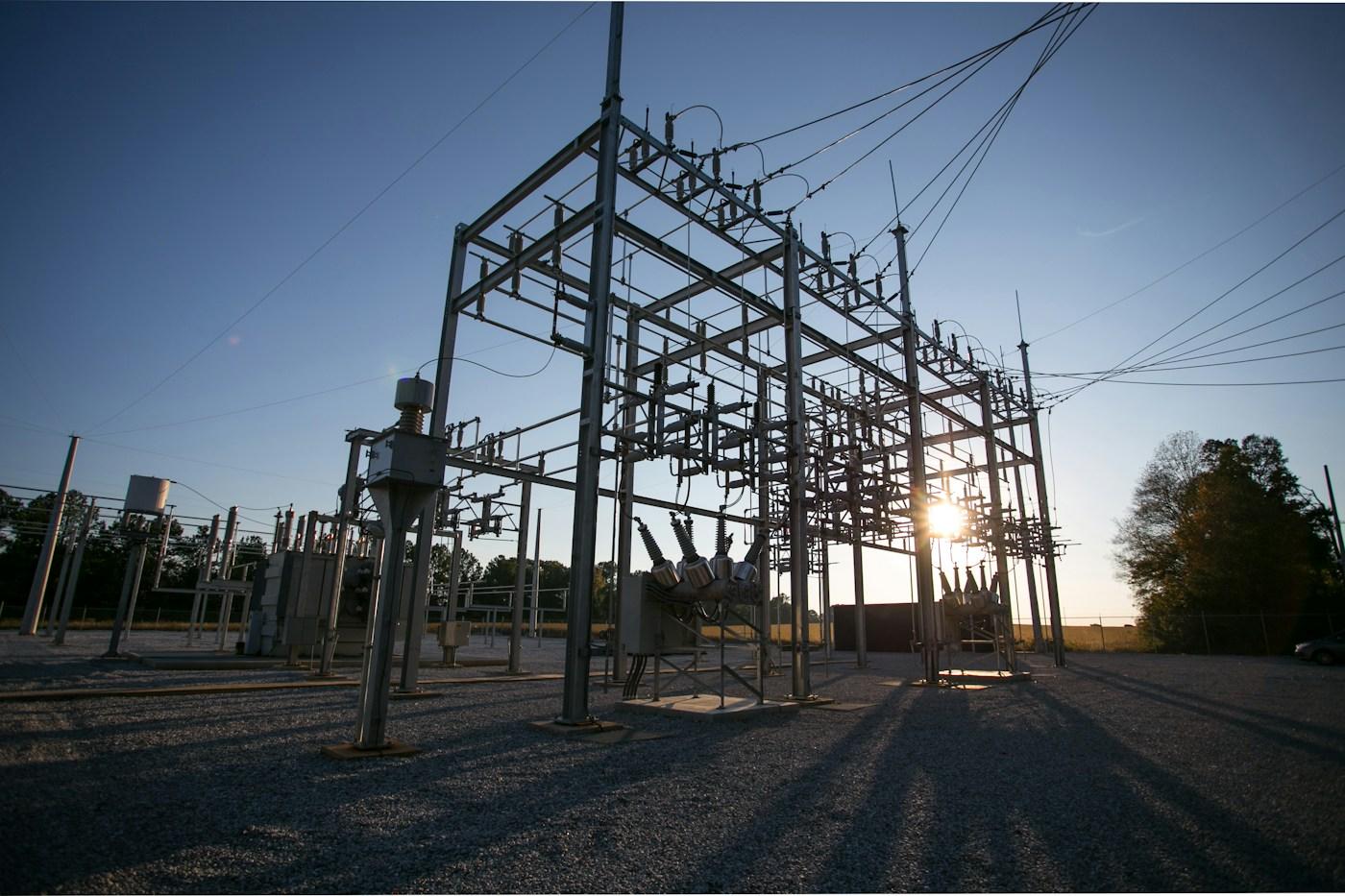 Substation steel structures against the setting sun